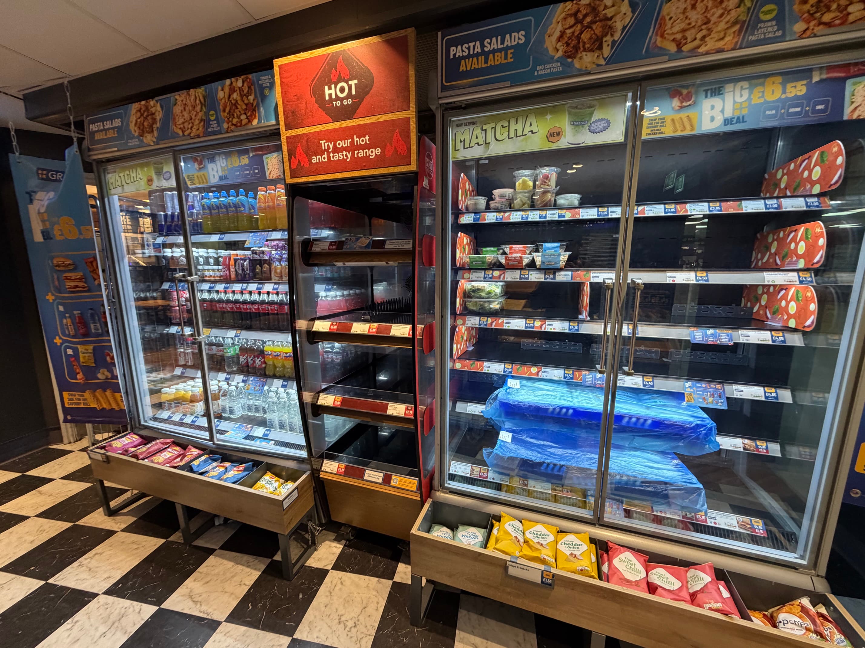 Greggs food counter and displayed prices at Leeds Bradford Airport